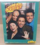 Image of puzzle cover showing the cast of the TV show Seinfeld.